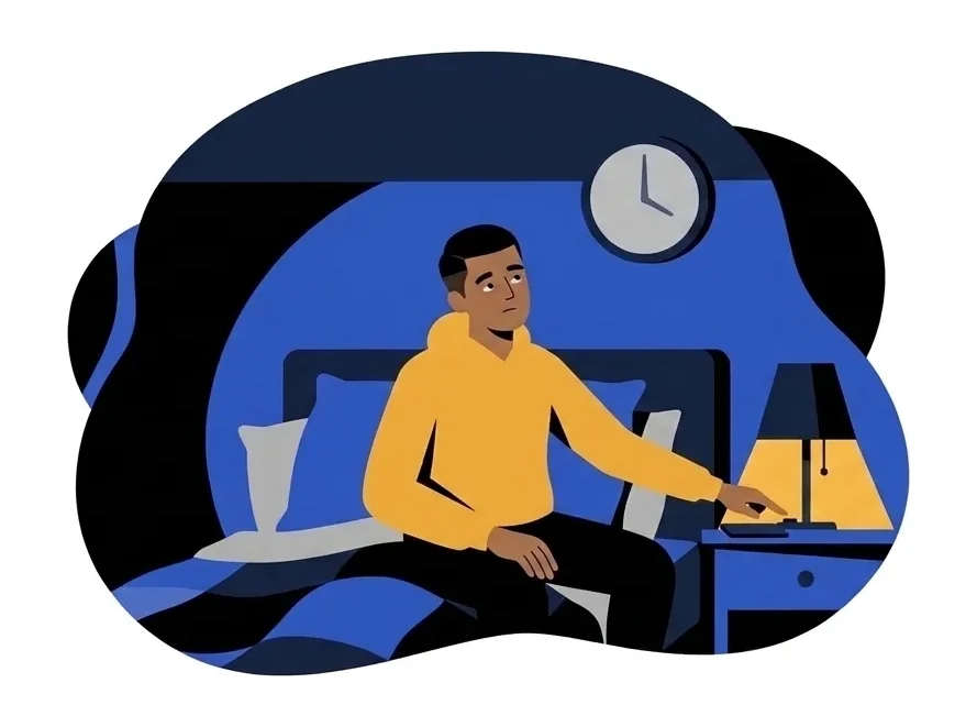 Omar sitting on the edge of his bed with a clock on the wall behind him, reaching toward the lamp on the nightstand